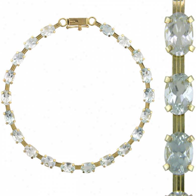 10k Yellow 6x4 Mm Oval Aquamarine Bracelet - 7 Inch