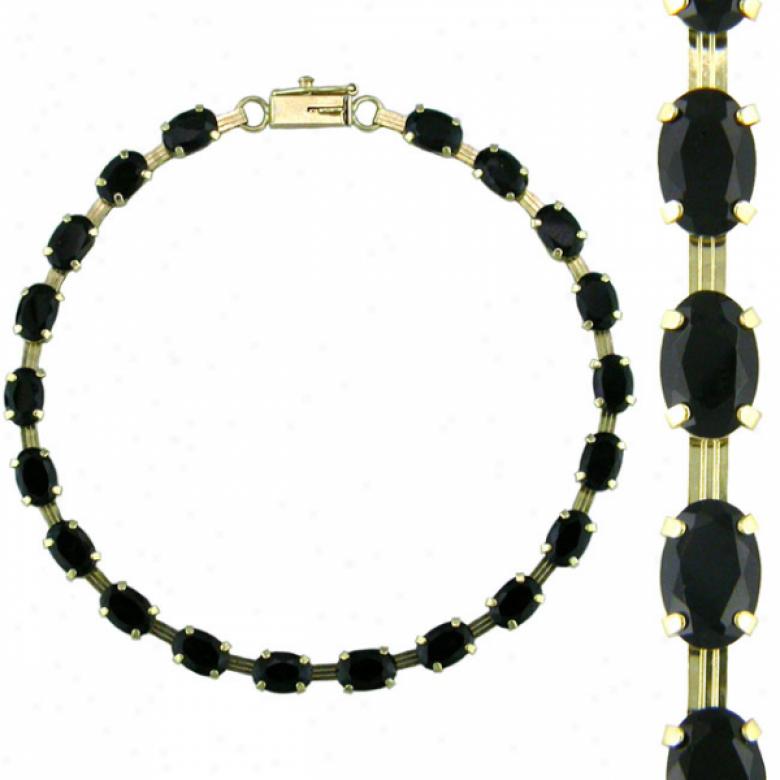 10k Yellow Oval Black Onyx Bracelet - 7 Inch
