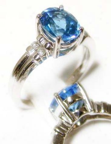 Elegant Blue Topaz & Diamond Ring